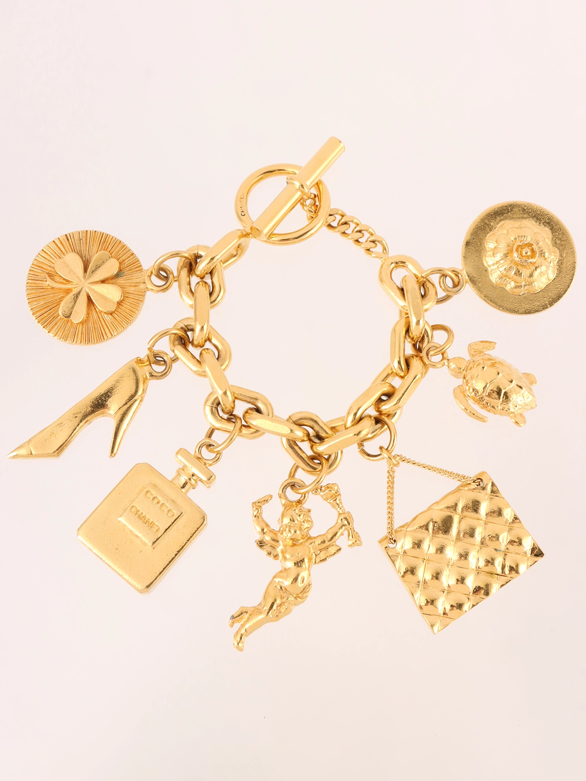 CHANEL チャームブレスレット 金色 CHANEL マルチモチーフチャームチェーンブレスレット ゴールド