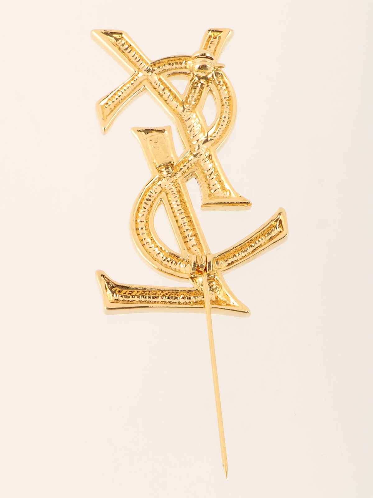 YVES SAINT LAURENT ロゴブローチ ゴールド｜VINTAGE QOO TOKYO